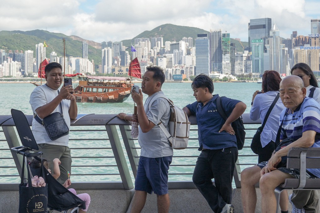 Tourists visit the Avenue of Stars in Tsim Sha Tsui. Photo: May Tse