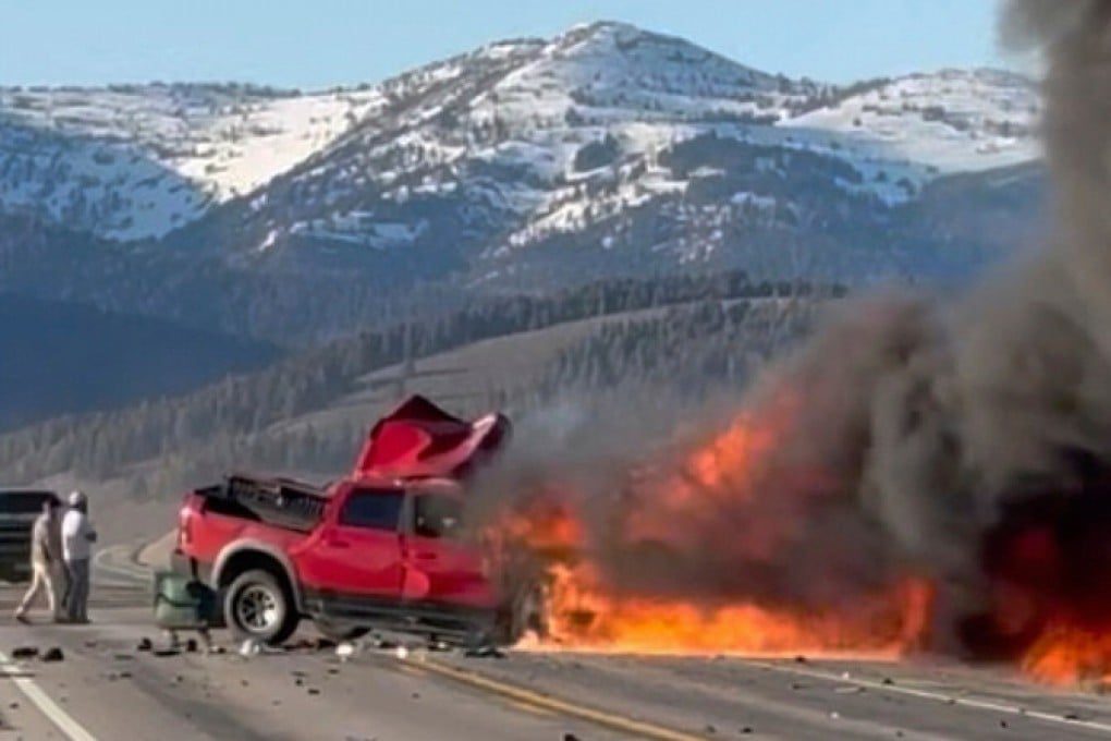 Rescuers at the scene of a deadly collision between a pickup truck and tour van near Henry’s Lake State Park in eastern Idaho on May 1. Photo: AP