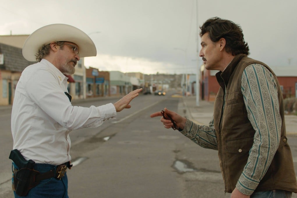 Joaquin Phoenix (left) as Sheriff Joe Cross and Pedro Pascal as Mayor Ted Garcia in a still from Eddington, directed by Ari Aster. Emma Stone co-stars