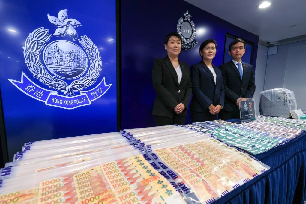 (From left) Chief Inspector Lo Yuen-shan, Superintendent Kwok Ching-yee and Senior Inspector Tse Ka-lun pose with items seized during an operation on Thursday. Photo: Nora Tam
