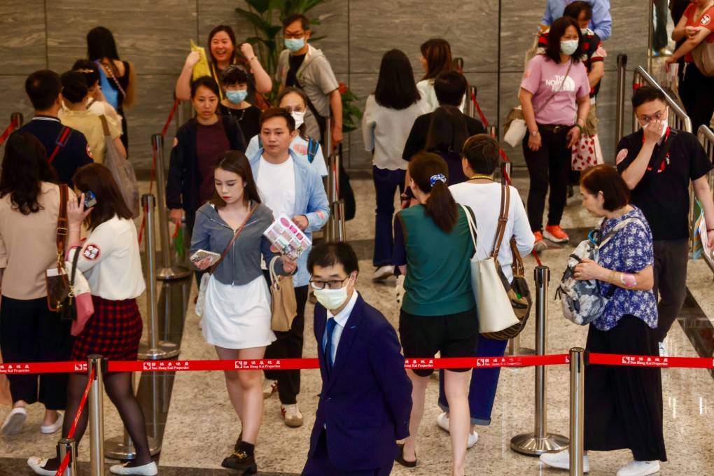 Buyers mingling inside a Sierra Sea sales showroom in West Kowloon on Sunday. Photo: Jonathan Wong