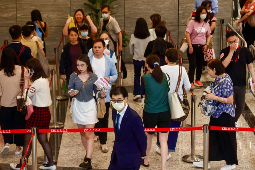 Buyers mingling inside a Sierra Sea sales showroom in West Kowloon on Sunday. Photo: Jonathan Wong