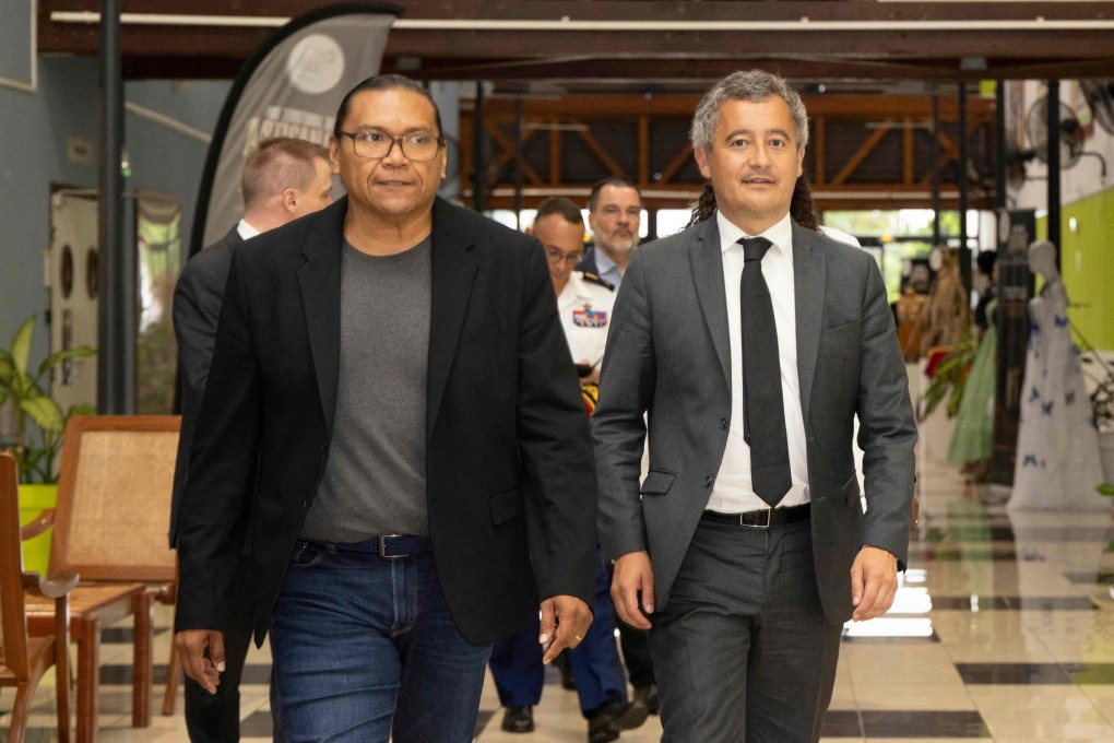 France’s Minister of Justice Gerald Darmanin (right) and First Vice-President of the French Guiana Territorial Authority, Jean-Paul Fereira (left) arrive for their meeting at the Hôtel de la Collectivité territoriale de Guyane in Cayenne, French Guiana, on Saturday. Photo: AFP