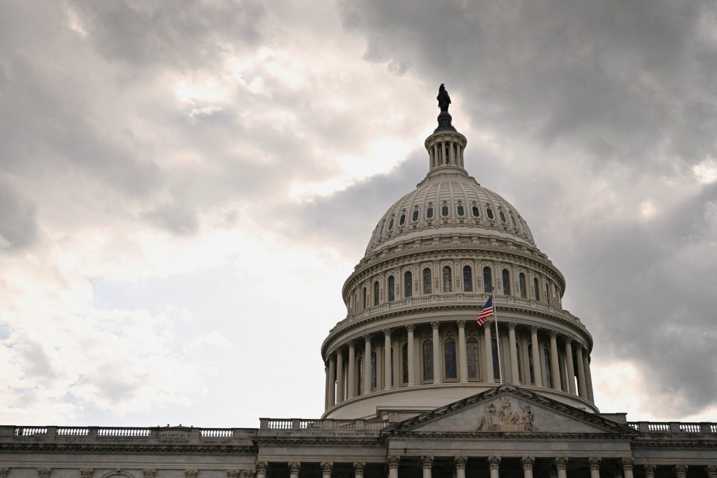 Clouds roll over the US Capitol in Washington ahead of a rare Sunday night session of the House Budget Committee. Photo: Reuters