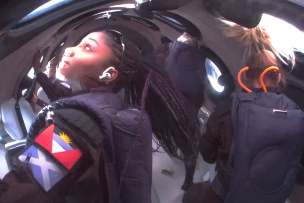 A still from a video from Virgin Galactic on August 10, 2023, with Anastatia Mayers (front left), 18, Jon Goodwin (back right), 80, and Chief Astronaut Instructor Beth Moses (front right) in space. Virgin Galactic had been selling seats on its forthcoming Delta spacecraft at about US$600,000 a seat. In 2026, it plans to charge more. Photo: Virgin Galactic/AFP