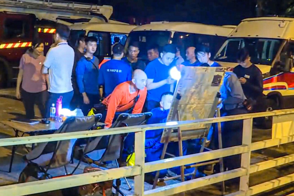 A screengrab of footage showing the rescue team coordinating the search for the 72-year-old woman. Photo: Cable TV News