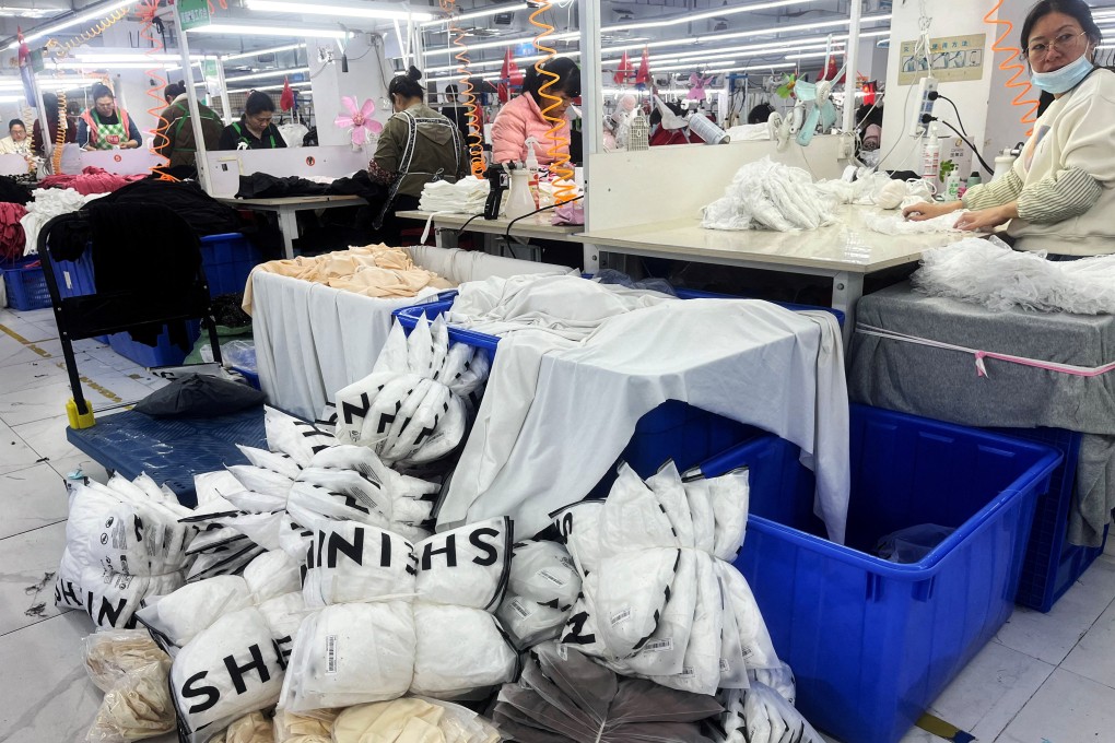 Workers are seen on a production line manufacturing clothing for Shein in Guangzhou, China’s Guangdong province. Photo: Reuters