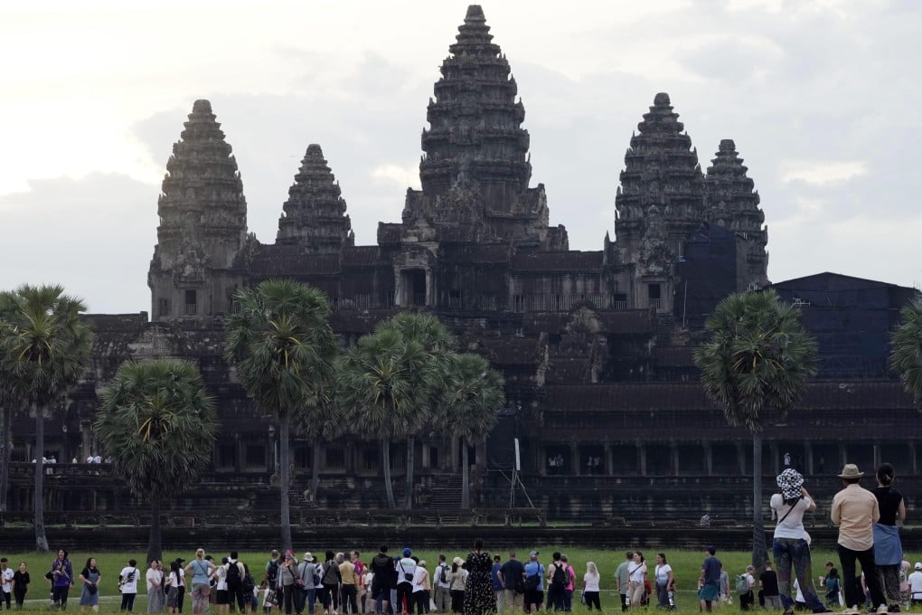 Tourists at the Angkor Wat temple complex in Siem Reap province, Cambodia. Photo: AP