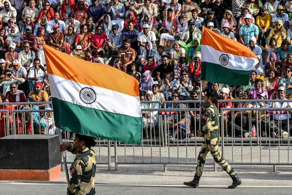 Indian Border Security Force personnel perform during the “beating retreat” ceremony at the Wagah border post on the border between India and Pakistan. Photo: AFP