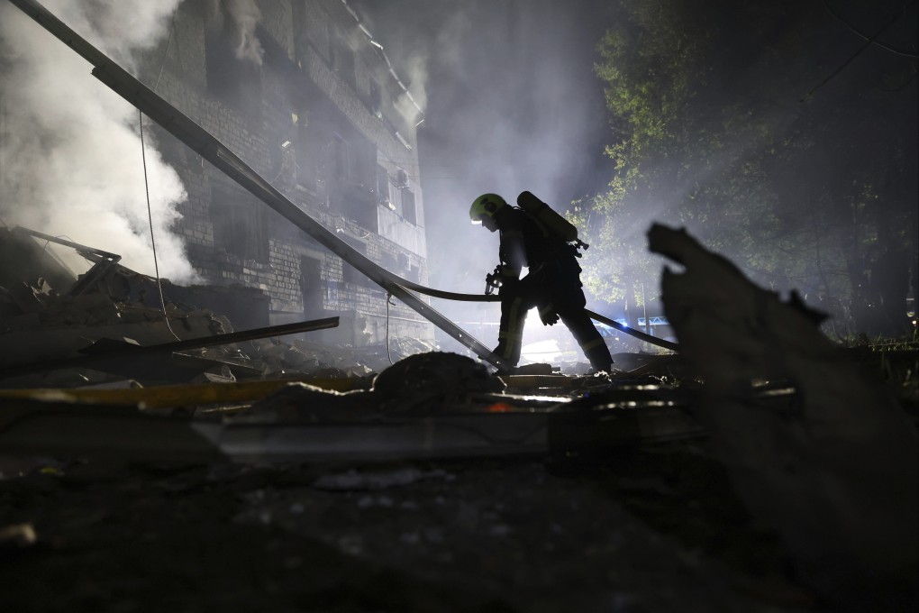 A rescuer works at the site of a residential building destroyed by a Russian strike in Zaporizhzhia, Ukraine, on May 1. Photo: AP
