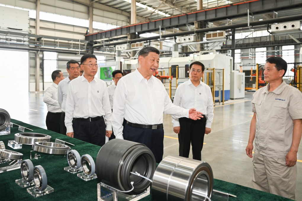President Xi Jinping learns about local efforts to accelerate the development of advanced manufacturing while visiting the Luoyang Bearing Group in Luoyang, Henan province, on Monday. Photo: Xinhua