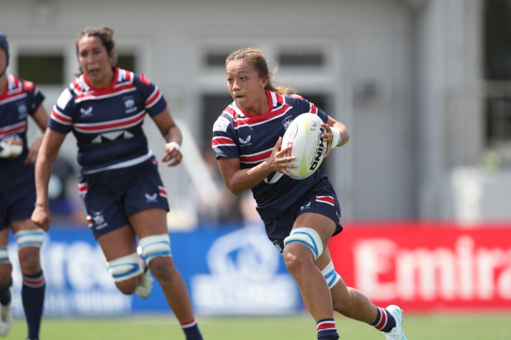 Au Yeung Sin-yi powers forward as Hong Kong take the fight to Kazakhstan. Photo: Hong Kong China Rugby