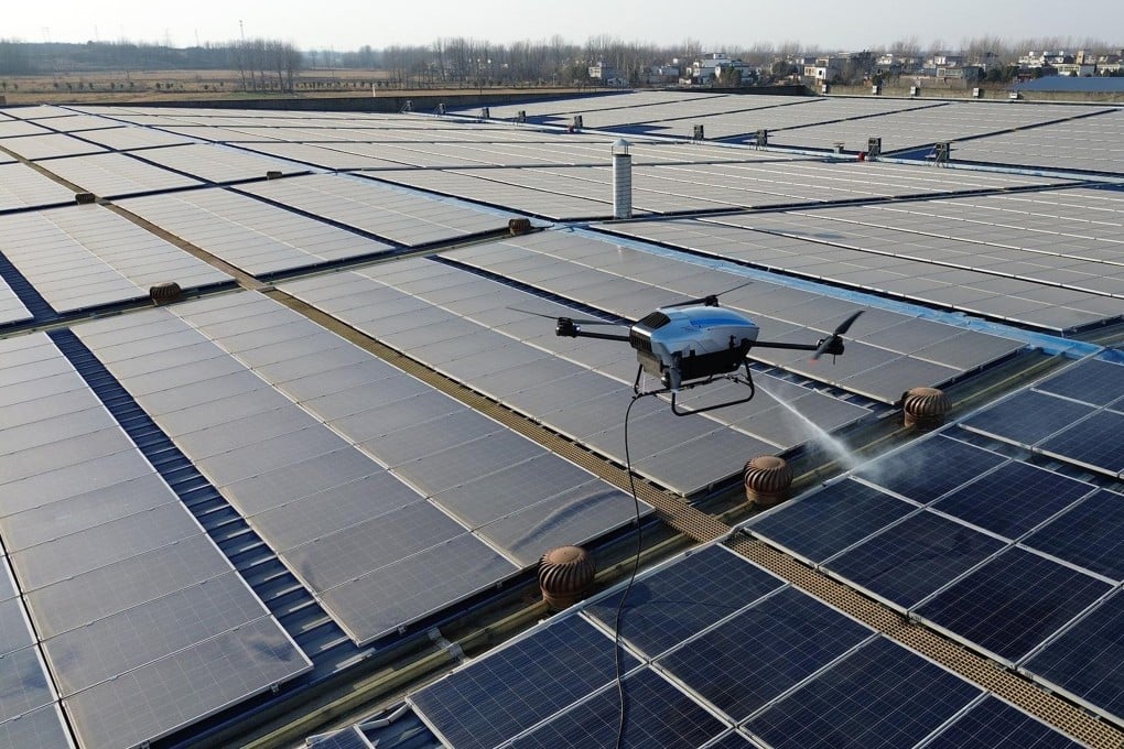 A HiTS drone powered by a hydrogen fuel cell cleans dust off roof-top solar panels. Photo: Handout