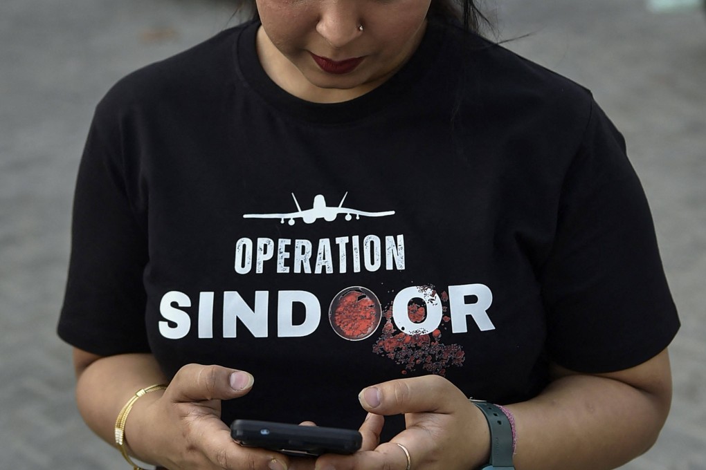 A woman wears in Ludhiana, India, wears a T-shirt emblazoned “Operation Sindoor”, the name of the military operation against Pakistan in response to a militant attack in Indian Kashmir. Businesses have cashed in on a surge in nationalism. Photo: AFP