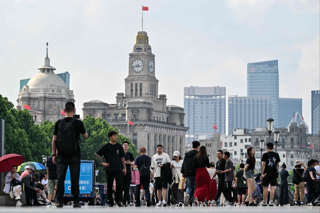 People visit The Bund in Shanghai. Photo: AFP
