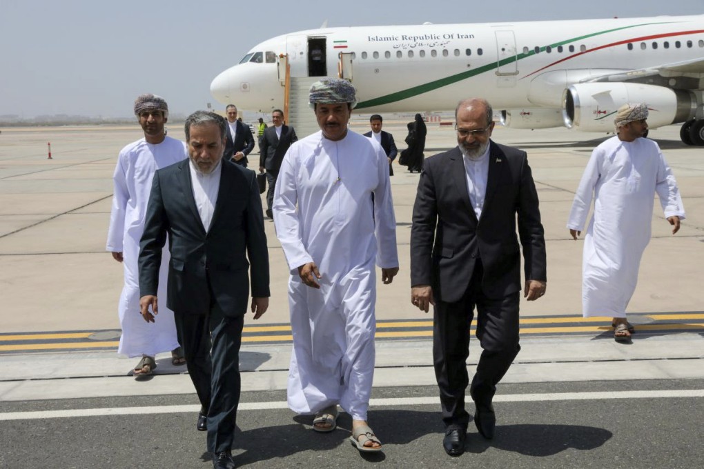 Iranian Foreign Minister Abbas Araghchi (left) is welcomed by Omani officials upon his arrival in Muscat, Oman, for negotiations with US Middle East envoy Steve Witkoff (not pictured), alongside Iranian Ambassador to Oman Mousa Farhang, on May 11. Photo: Iranian Foreign Ministry via AP