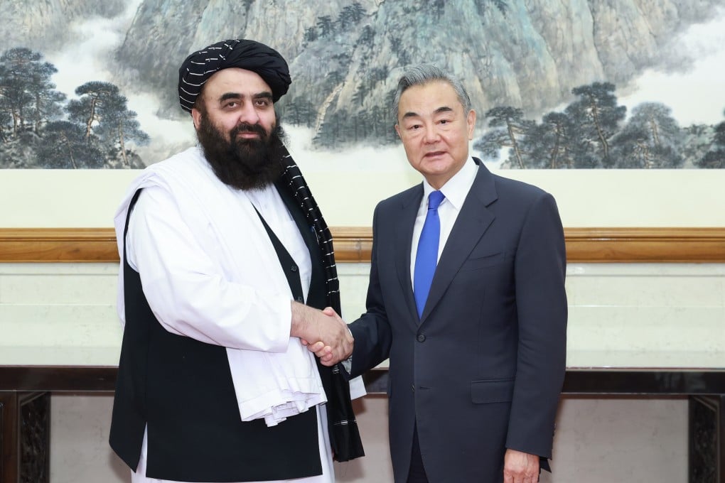 Chinese Foreign Minister Wang Yi (right) meets Afghan acting foreign minister Amir Khan Muttaqi in Beijing on Wednesday. Wang encouraged counterparts from Afghanistan and Pakistan to upgrade diplomacy as soon as possible. Photo: Xinhua