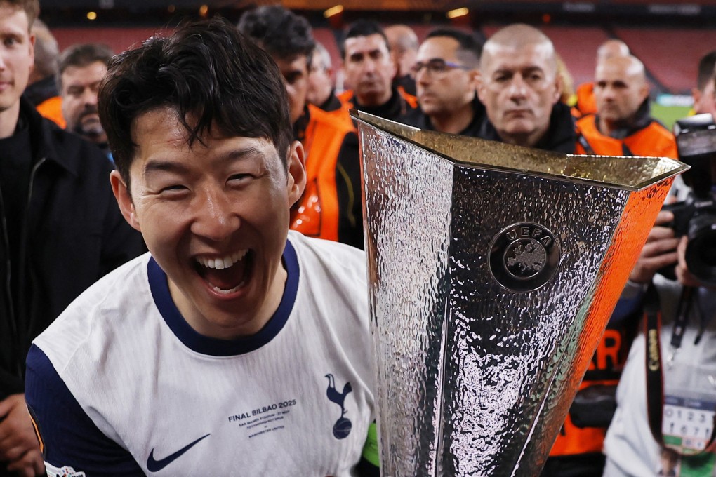 Tottenham Hotspur’s Son Heung-min celebrates with the trophy after winning the Europa League final. Photo: Reuters