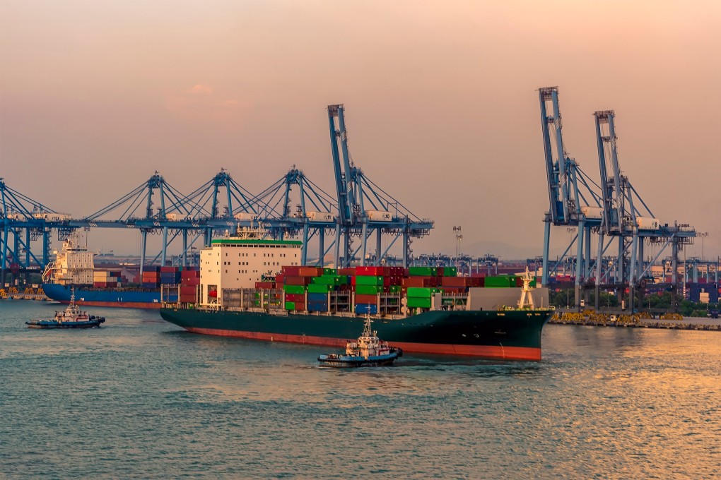 A ship coming into berth at the container terminal at sunset in port Klang near Kuala Lumpur. Malaysia’s exports to the US bear the blanket 10 per cent levy. Photo: Shutterstock
