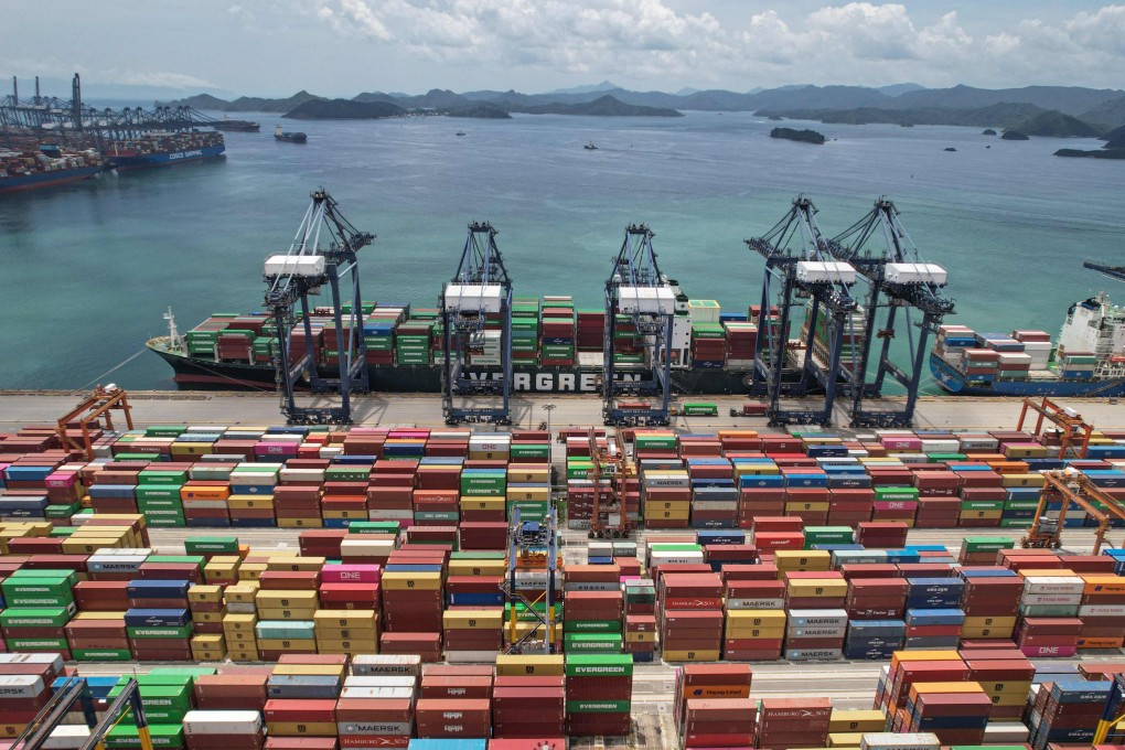 Cargo containers are seen stacked at a port in Shenzhen, which registered a 2.9 per cent drop in the value of exports last month. Photo: AFP