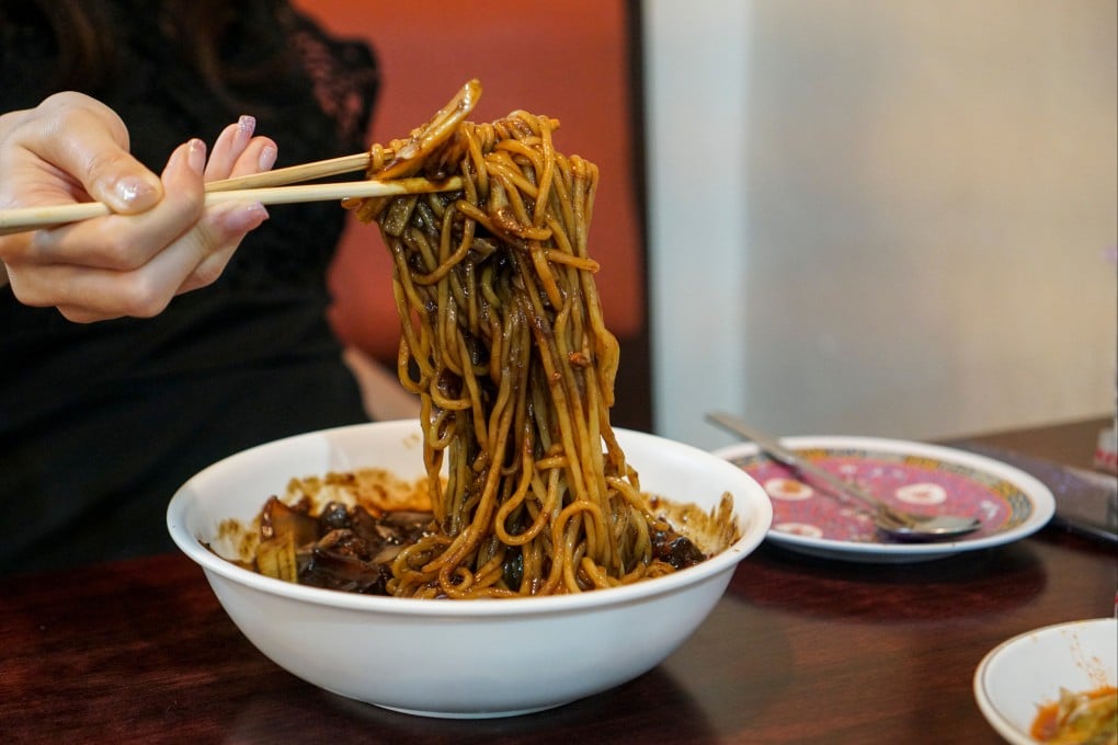 The classic Korean-Chinese dish of black bean paste noodles (jajangmyeon) is a descendant of the Chinese dish zhajiangmian. Photo: Shutterstock
