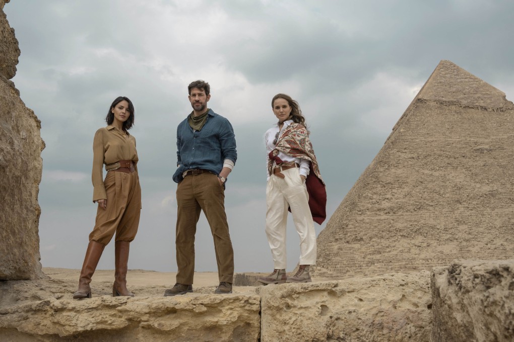 (From left) Eiza Gonzalez, John Krasinski and Natalie Portman in a scene from Fountain of Youth, a lighthearted, globe-trotting heist movie from Guy Ritchie. Photo: AP