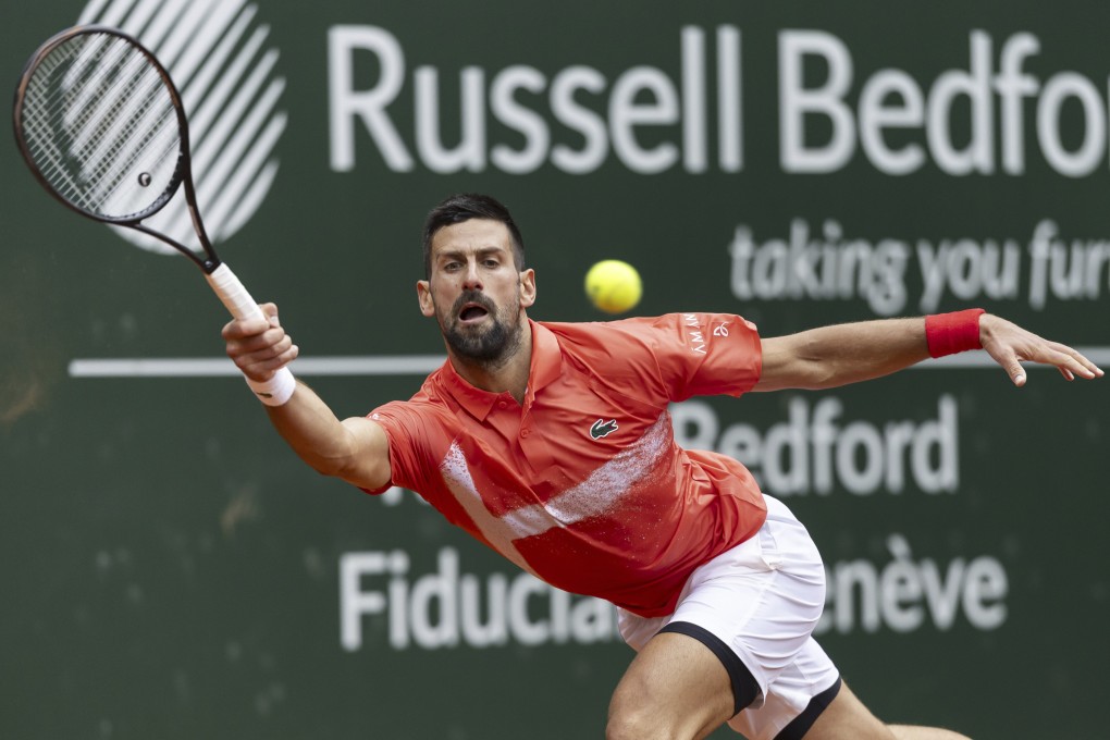 Novak Djokovic returns a ball to Hungary’s Marton Fucsovics during the Geneva Open on Wednesday. Photo: AP