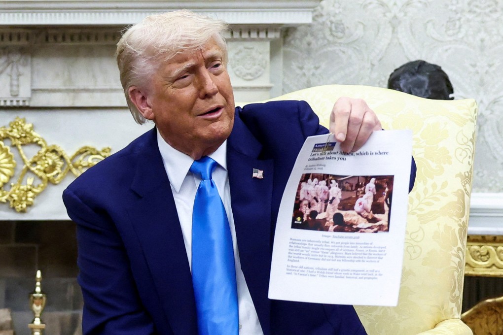 US President Donald Trump shows an article claiming white genocide in South Africa at the White House in Washington on May 21. Photo: Reuters