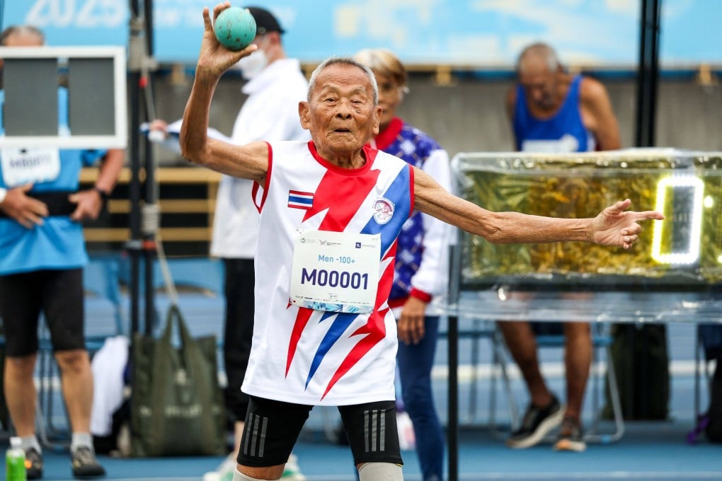 Thailand’s Sawang Janpram, the oldest competitor at the 2025 World Masters Games at 105 years old, competes during the men’s shot put for the 100+age group. Photo: AFP