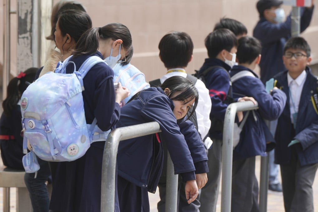 Children wait at the end of a school day at Tsz Wan Shan on February 27. Photo: Sam Tsang