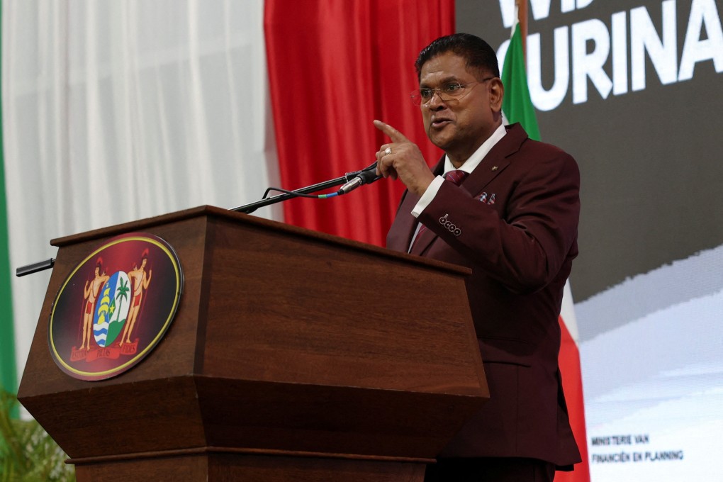 Suriname’s President Chan Santokhi speaks at an event where he distributed certificates for interest-bearing savings notes to elderly and disabled people, as part of the ‘Royalties for Everyone’ program drawing on oil revenues, ahead of the May 25 National Assembly election, in Paramaribo, Suriname, on May 14. Photo: Reuters