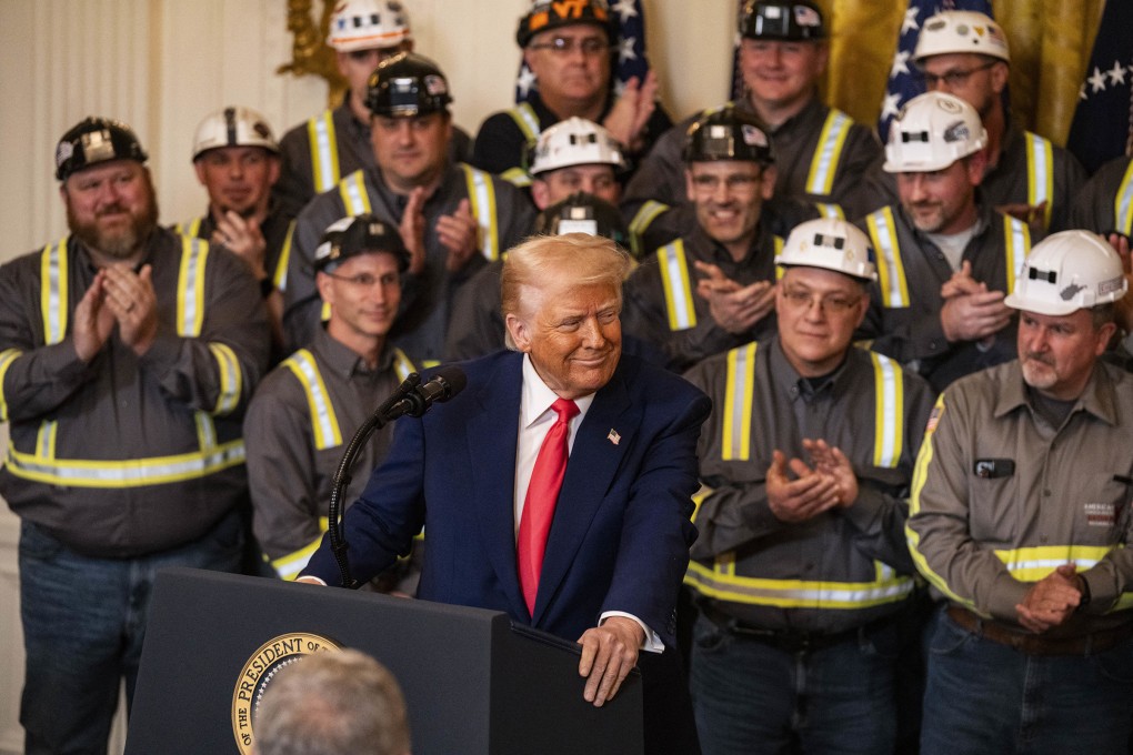 President Donald Trump signs an executive order to ‘Make Coal Clean Again,’ in Washington on April 8. Photo: TNS