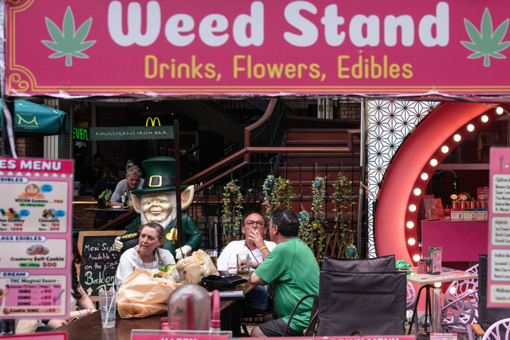 A cannabis dispensary stand on Khao San Road in Bangkok on Friday. Photo: AFP