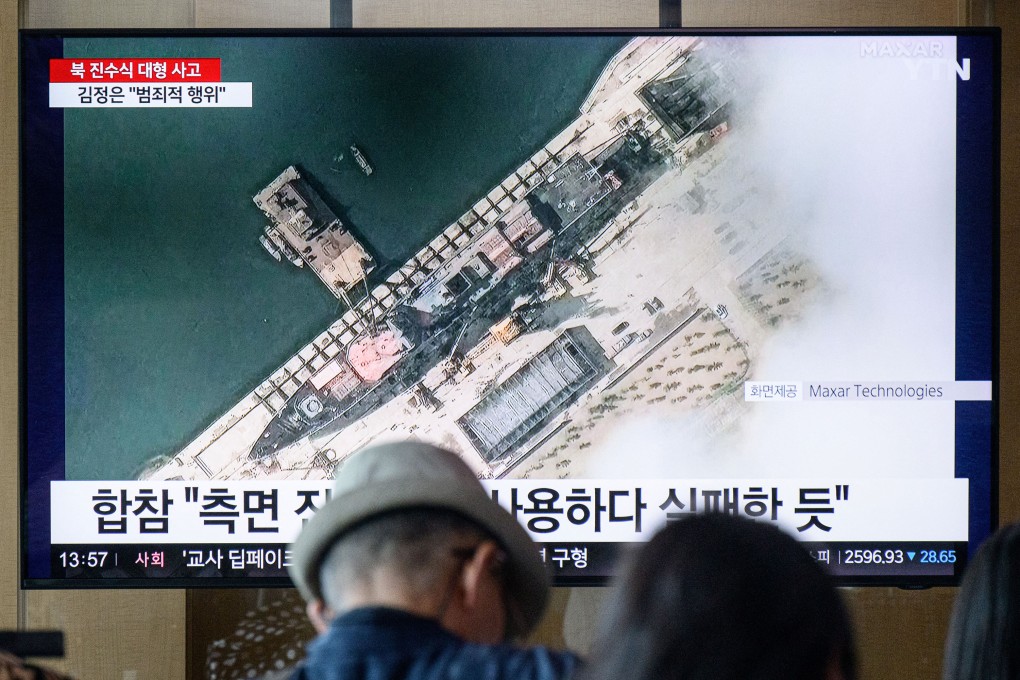 News footage featuring a satellite view of a new North Korean warship is shown in Seoul, South Korea, on Thursday. Photo: TNS