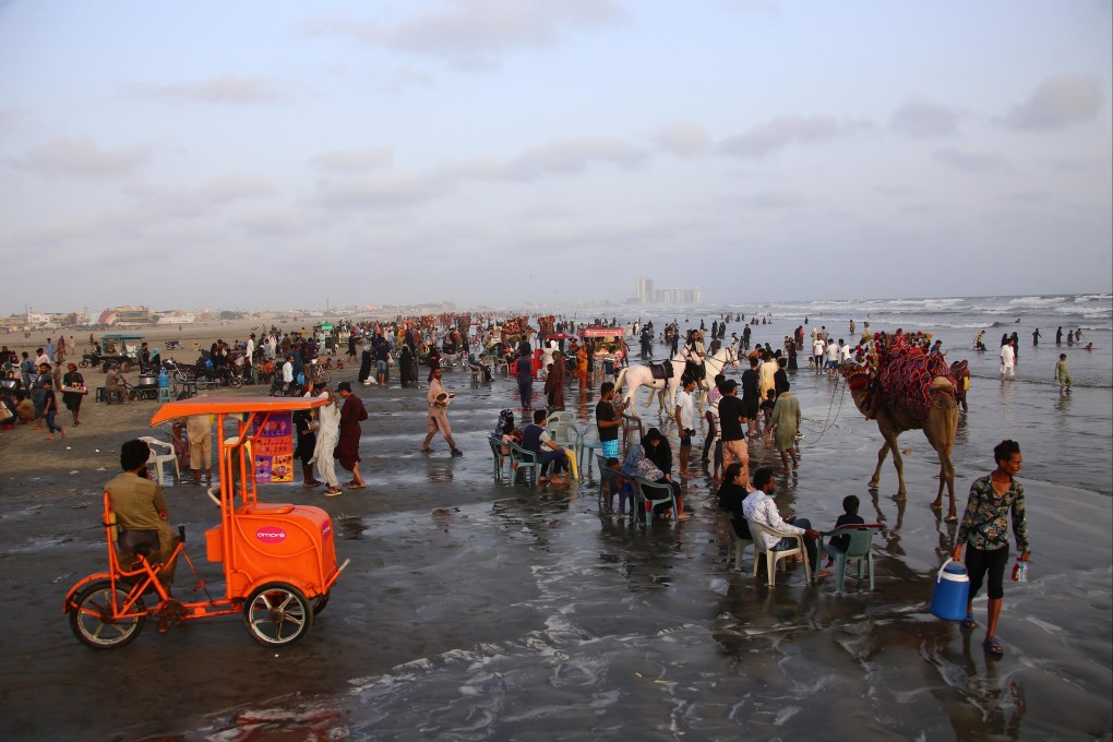 People cool off in the Arabian Sea during a heatwave in Karachi, Pakistan, on Saturday. Photo: EPA-EFE