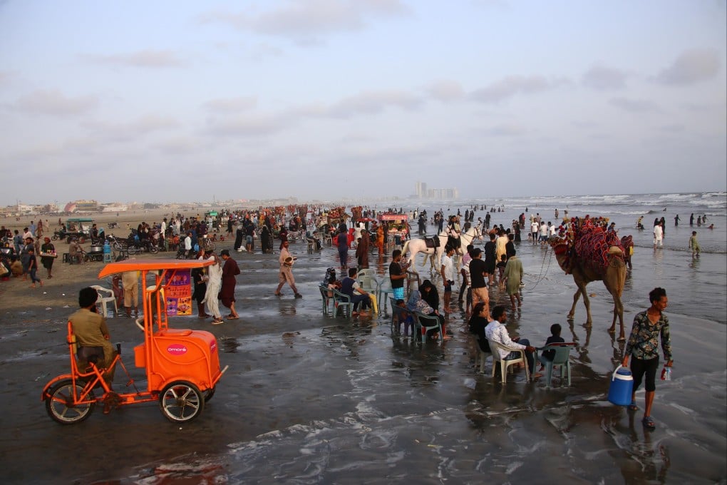 People cool off in the Arabian Sea during a heatwave in Karachi, Pakistan, on Saturday. Photo: EPA-EFE