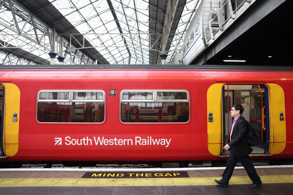 Passengers get on a South Western Railway service at a station in London, Britain, on Saturday. Photo: EPA-EFE