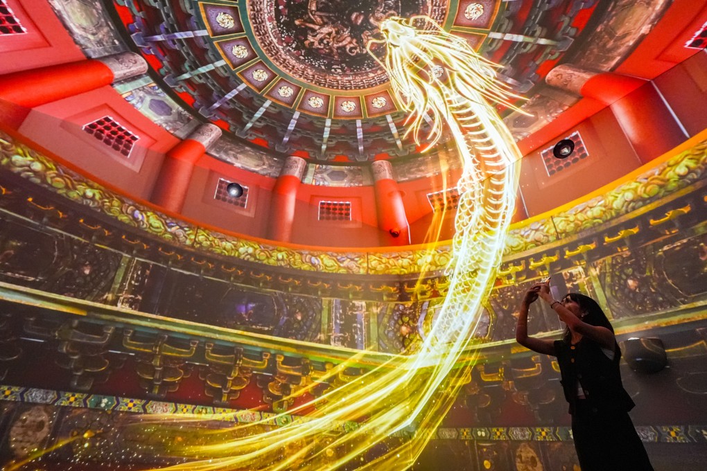 Visitors at the Hong Kong exhibition can enjoy moving images of dragons, phoenixes and other icons associated with the Forbidden City. Photo: Eugene Lee