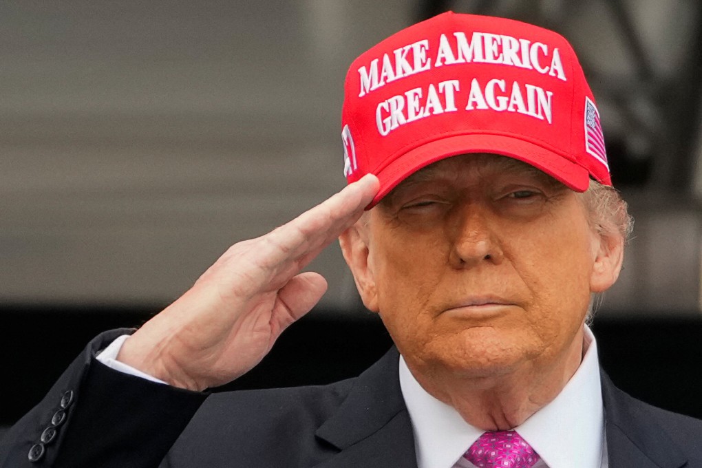 US President Donald Trump salutes during the commencement ceremony at West Point Military Academy in New York on Saturday. Photo: Reuters