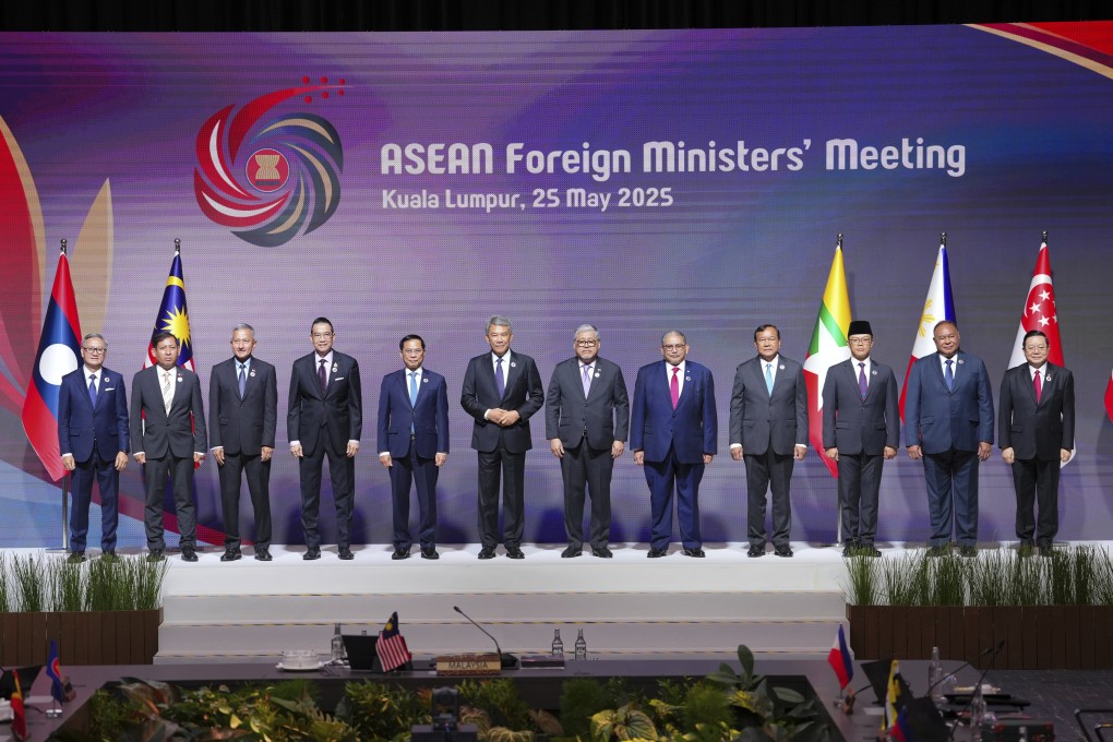 Asean foreign ministers pose for a group photo during a ceremony in Kuala Lumpur on Sunday. Photo: AP