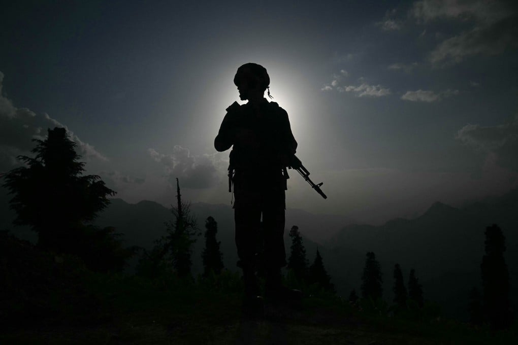 A soldier stands guard near the border in Indian-controlled Kashmir on May 19. Photo: AFP/Getty Images/TNS