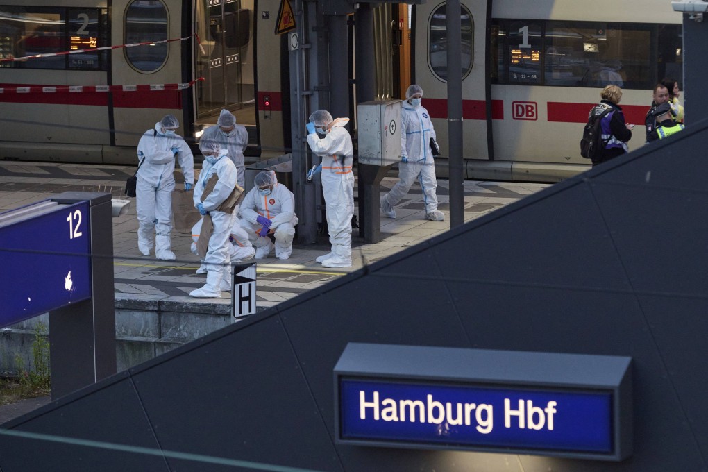 Police and forensics experts at Hamburg Central Station in Germany after Friday’s stabbing attack. Photo: dpa via AP