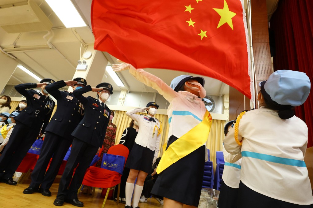 Pupils take part in a flag-raising competition in Sha Tin. Photo: Dickson Lee