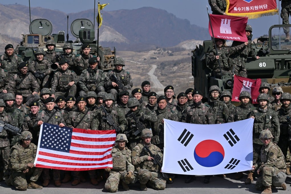 South Korean and US soldiers pose for photos after a live-fire exercise in Pocheon last year as part of the annual Freedom Shield joint military exercise. Photo: Reuters