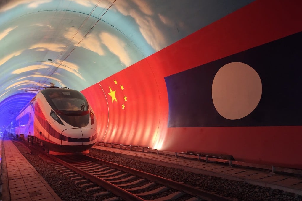The Lane Xang electric multiple unit (EMU) train passes by the China-Laos borderline inside a tunnel. China is the largest bilateral lender for Laos and six other land neighbours. Photo: Xinhua