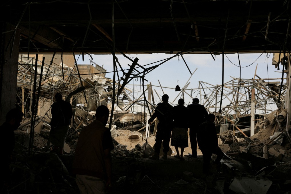 People inspect the damage at Sanaa International Airport in the aftermath of an Israeli airstrike on May 7, 2025. Photo: Reuters