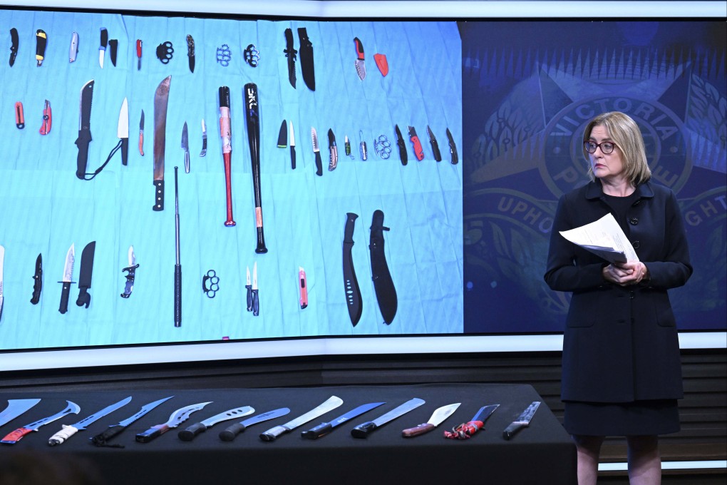 Jacinta Allan, premier of Australia’s Victoria state, looks at a display of machetes at Victoria Police Headquarters in Melbourne, Australia, earlier this year. Photo: AAP Image via AP