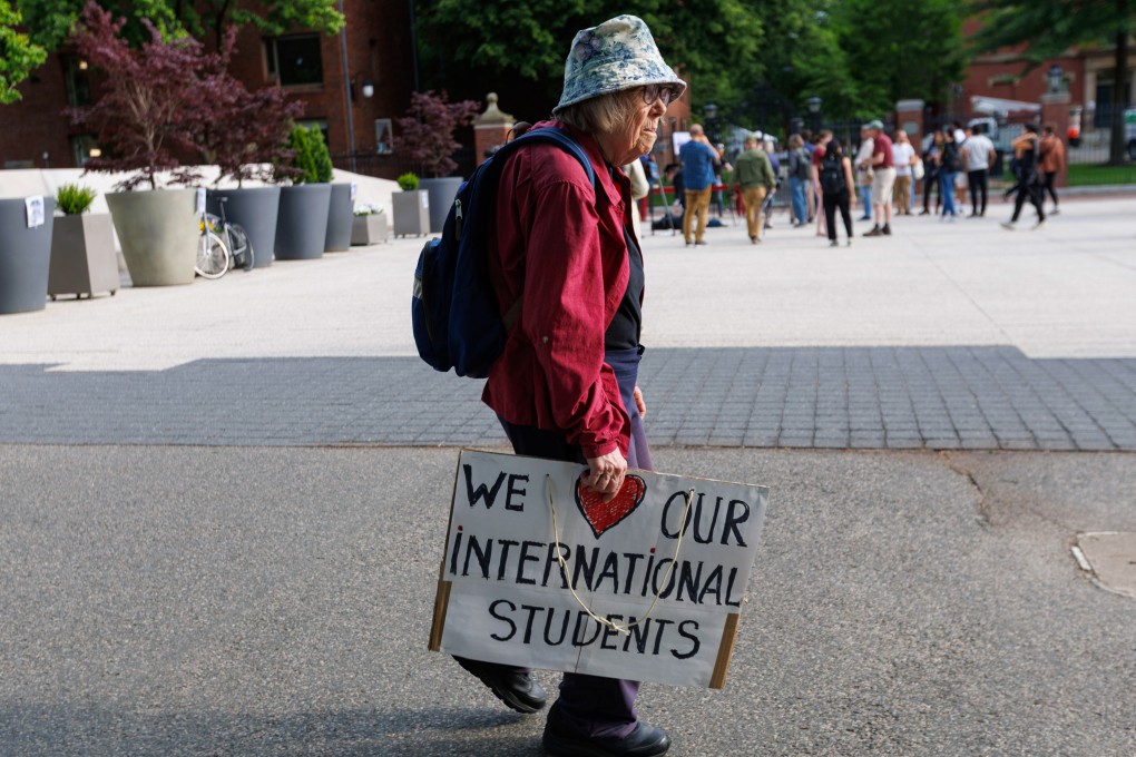 A protestor arrives at a rally in support of Harvard’s international student population at the university’s campus in Cambridge, Massachusetts, on Tuesday. Photo: EPA-EFE