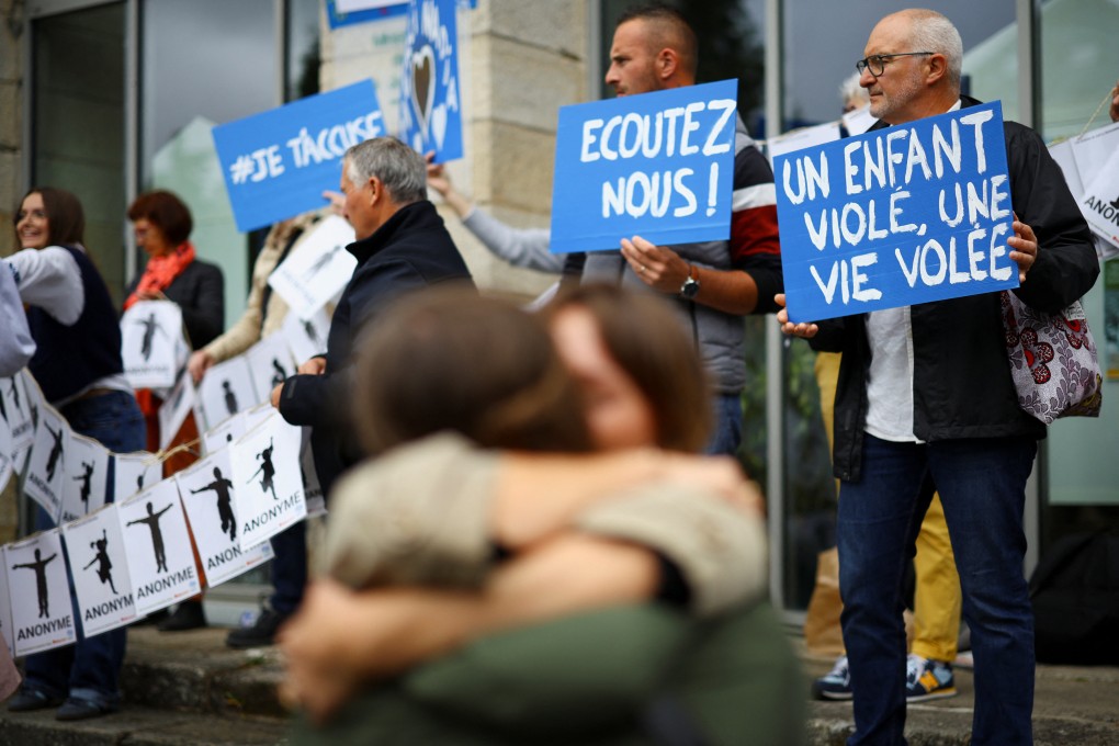 A group of alleged victims, members of women’s collectives, NGOs and unions gather in front of the courthouse on Wednesday, the day of the verdict of ex-surgeon Joel Le Scouarnec who was charged with the aggravated rape and sexual assault against hundreds of children over several decades, in Vannes, France. Photo: Reuters