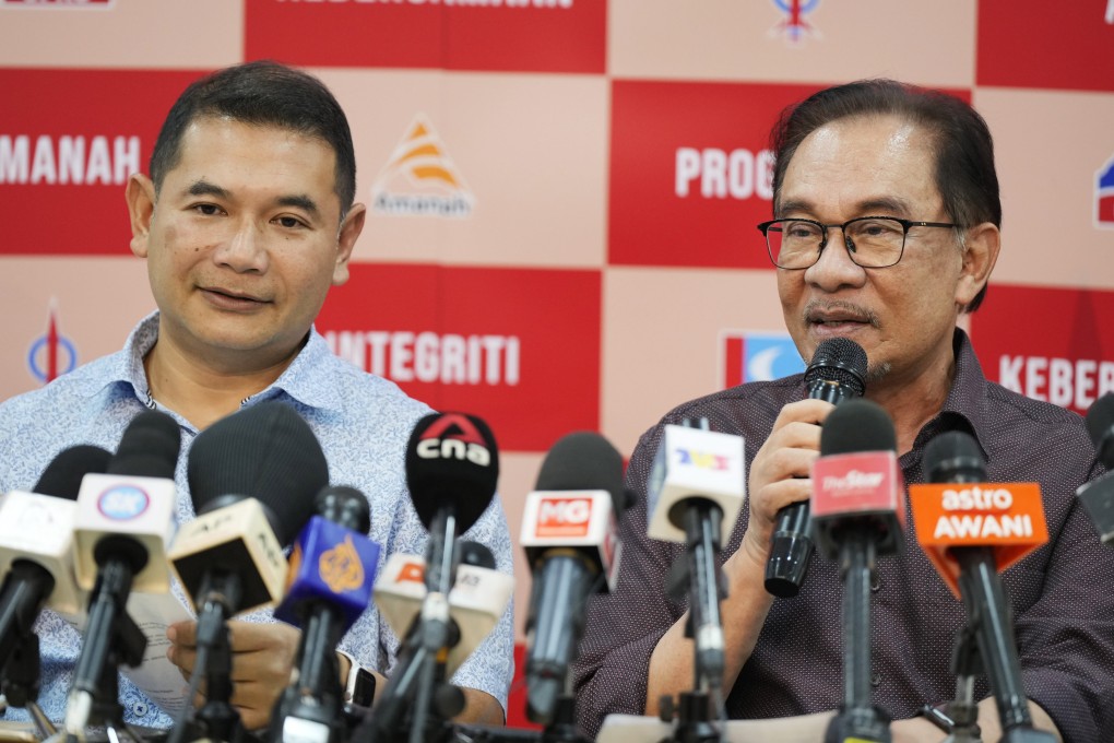 Rafizi Ramli (left), PKR’s then-deputy president, pictured at a press conference with Anwar Ibrahim in 2022. Photo: AP